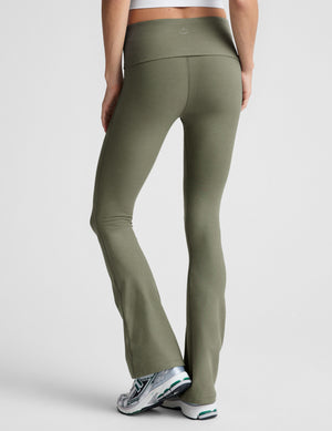 green bootcut pants with a foldover waistband. 