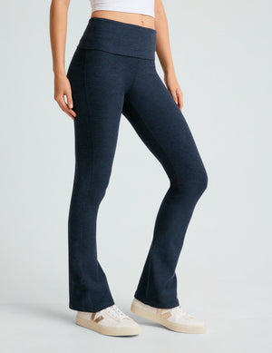 Model wears Navy Spacedye Foldover Bootcut Pant with a marled texture, high foldover waistband, and flared ankles.