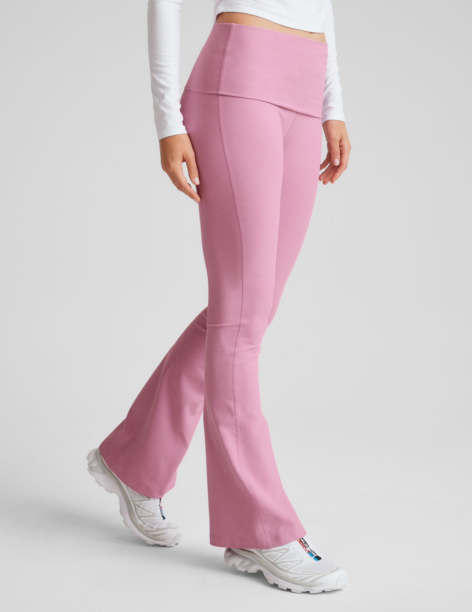 pink bootcut pants with a foldover waistband. 