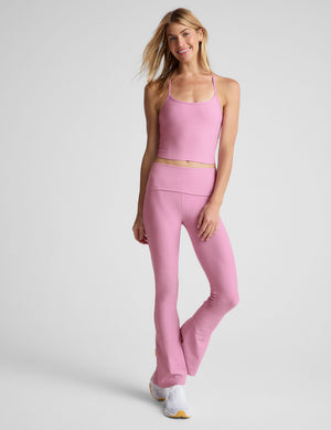 pink bootcut pants with a foldover waistband. 
