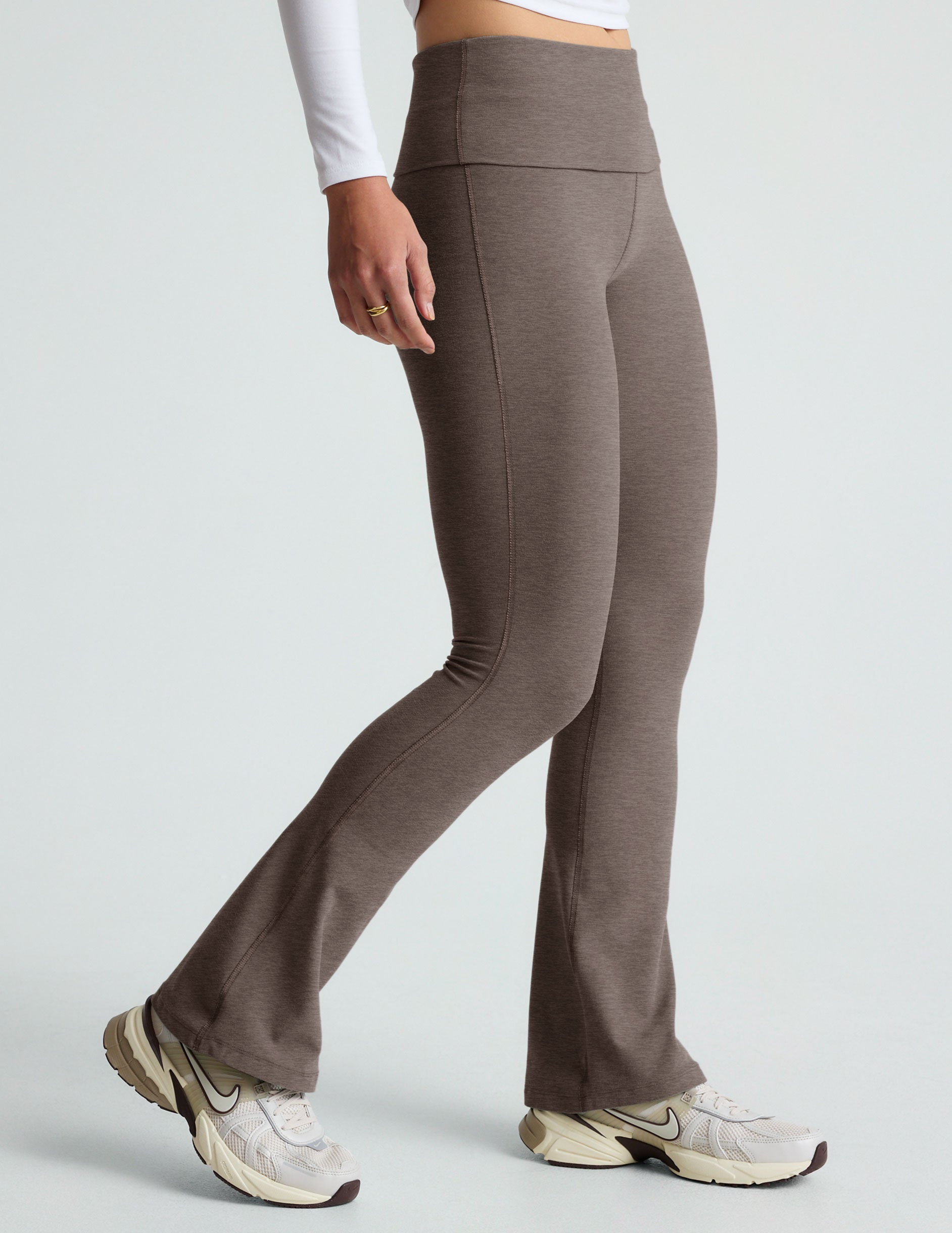 brown bootcut pants with a foldover waistband. 