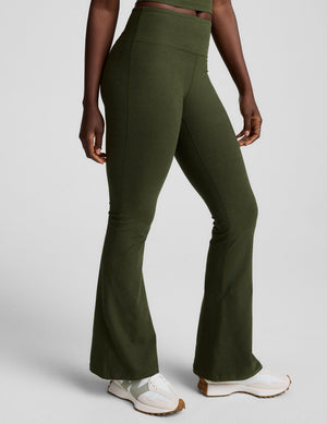 green mid-rise bootcut pants. 