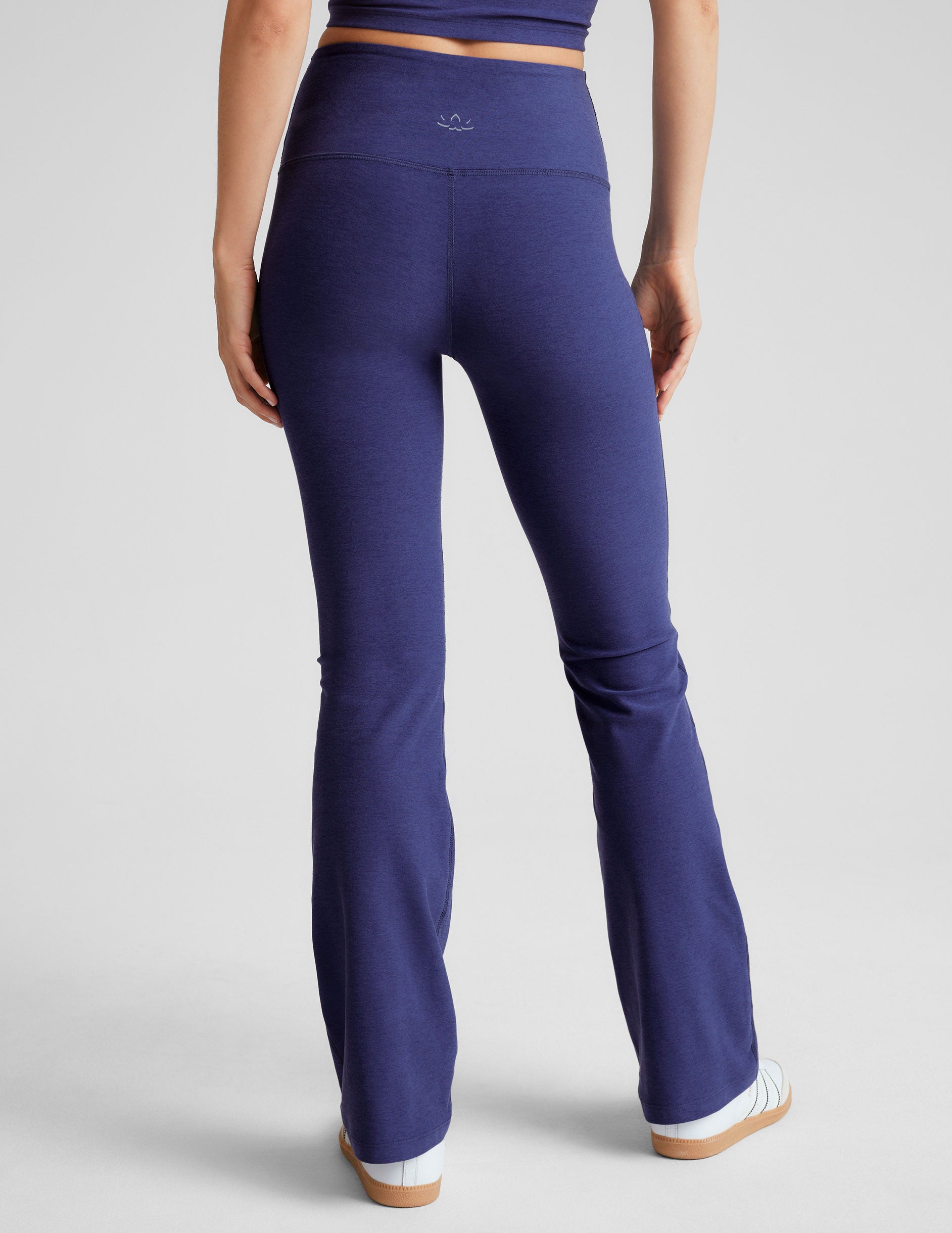 blue high-waisted bootcut pant with pockets. 