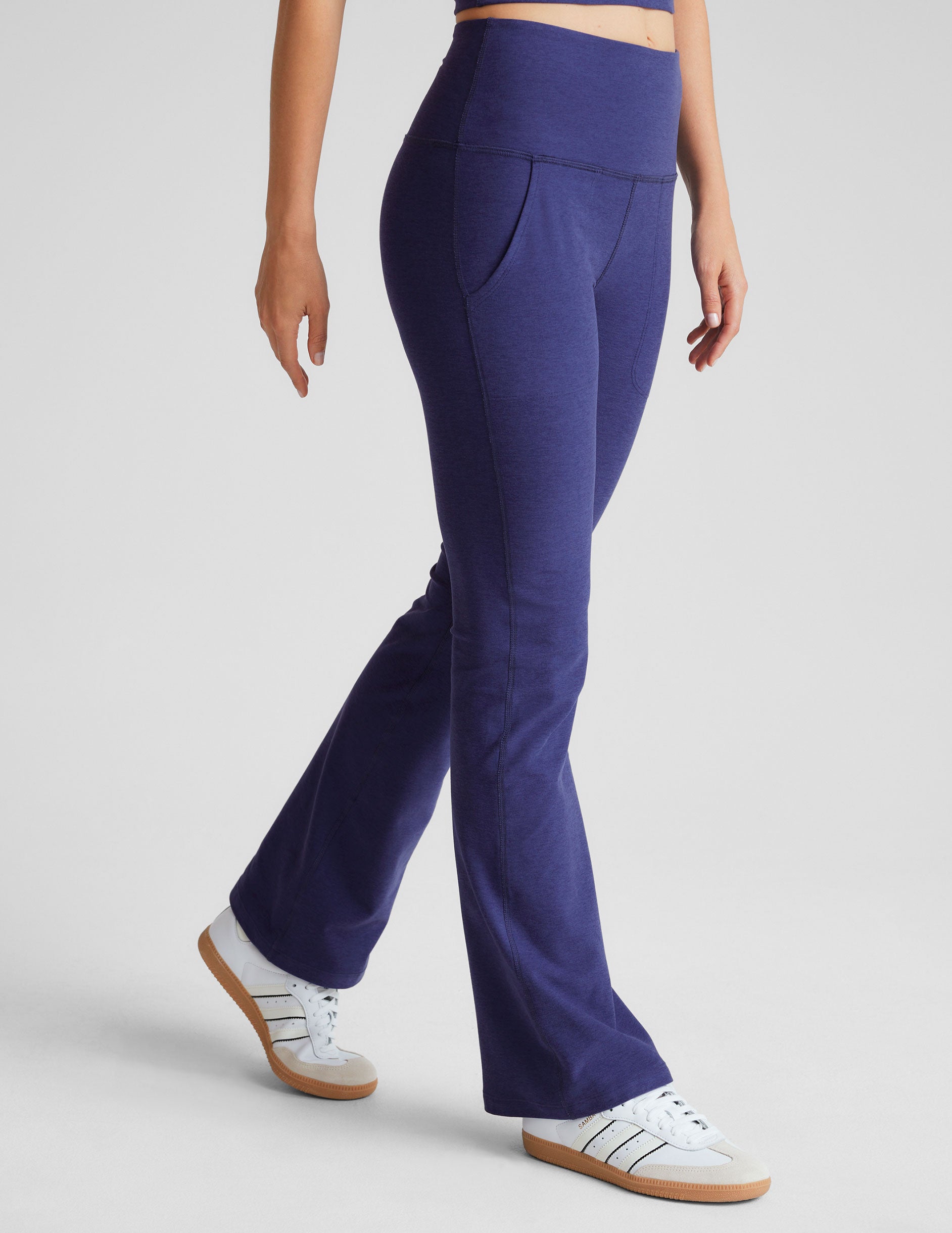 blue high-waisted bootcut pant with pockets. 