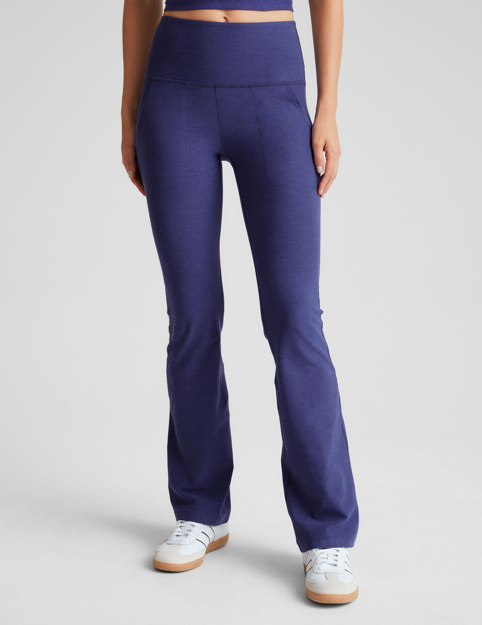 blue high-waisted bootcut pant with pockets. 