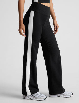 Black Spacedye Line Up Wide Leg Pant with white side stripes and high waist, featuring a marled texture in a side view.