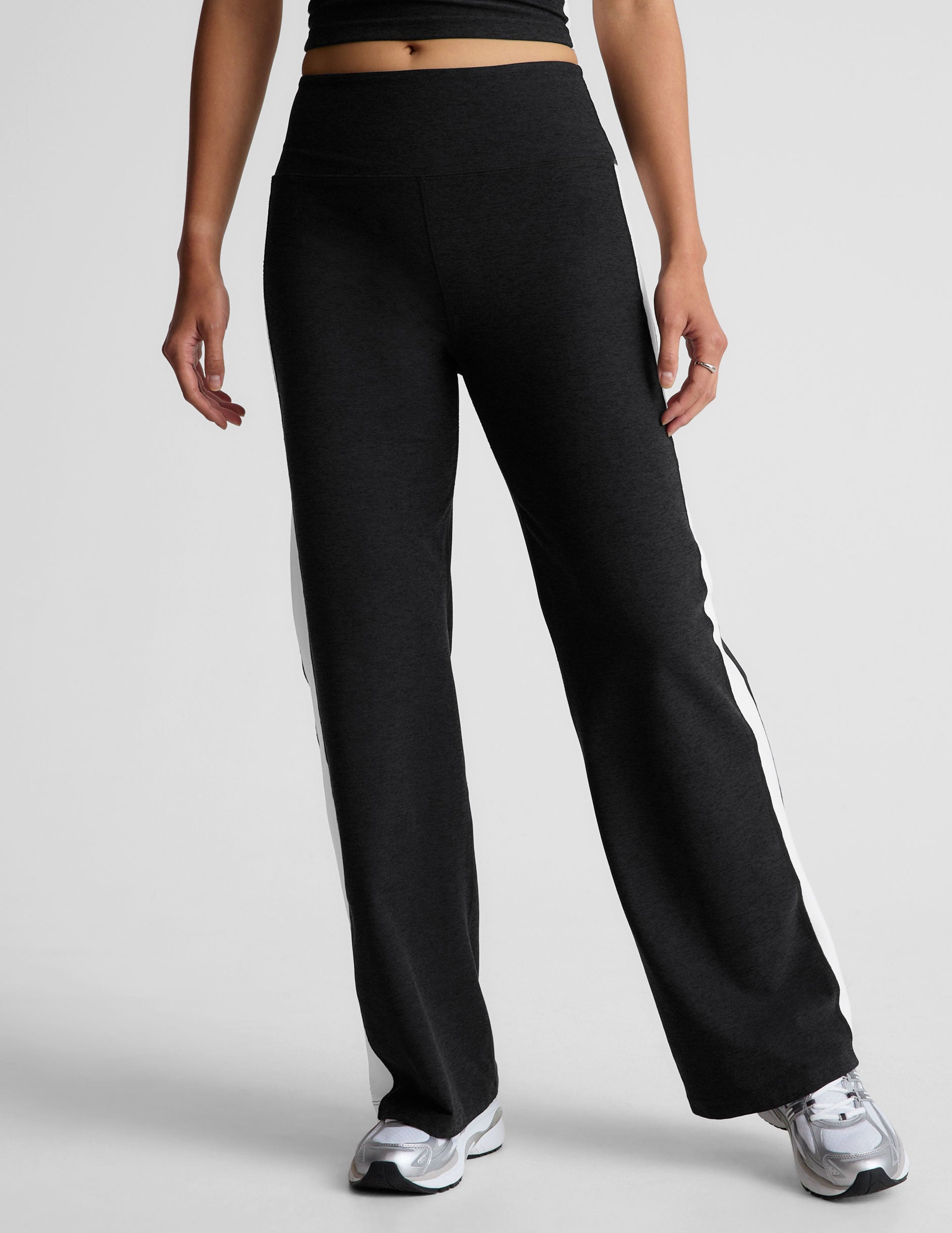 black wide leg pants with a 4" waistband and white contrast panels on sides. 