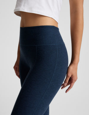 Side view of navy Spacedye Pintuck Kick Flare High Waisted Pant showing the high-rise waistband and vertical pintuck seam.