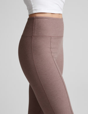 Side view of brown Spacedye Pintuck Kick Flare High Waisted Pant with a wide high-rise waistband and vertical pintuck seam.