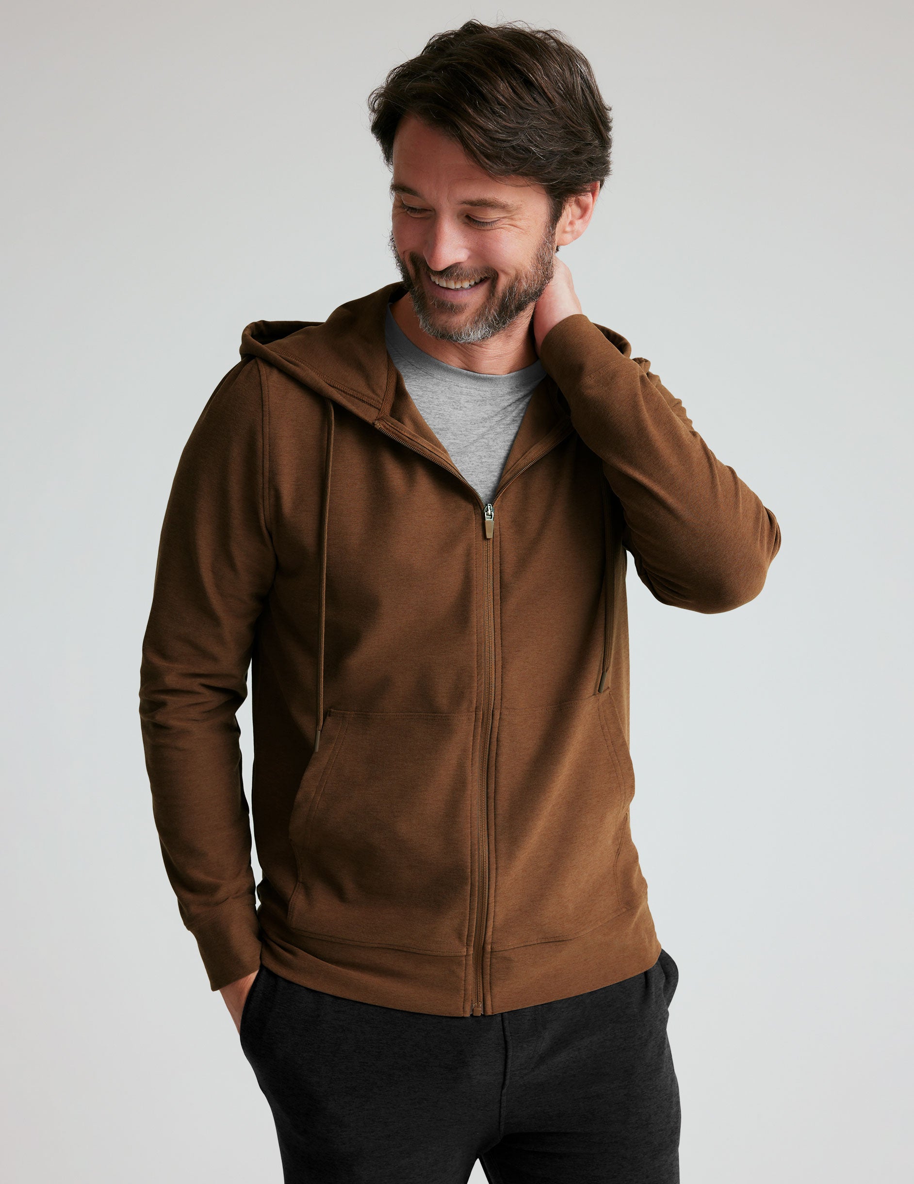 brown men's zip-up jacket with a hood and pockets. 