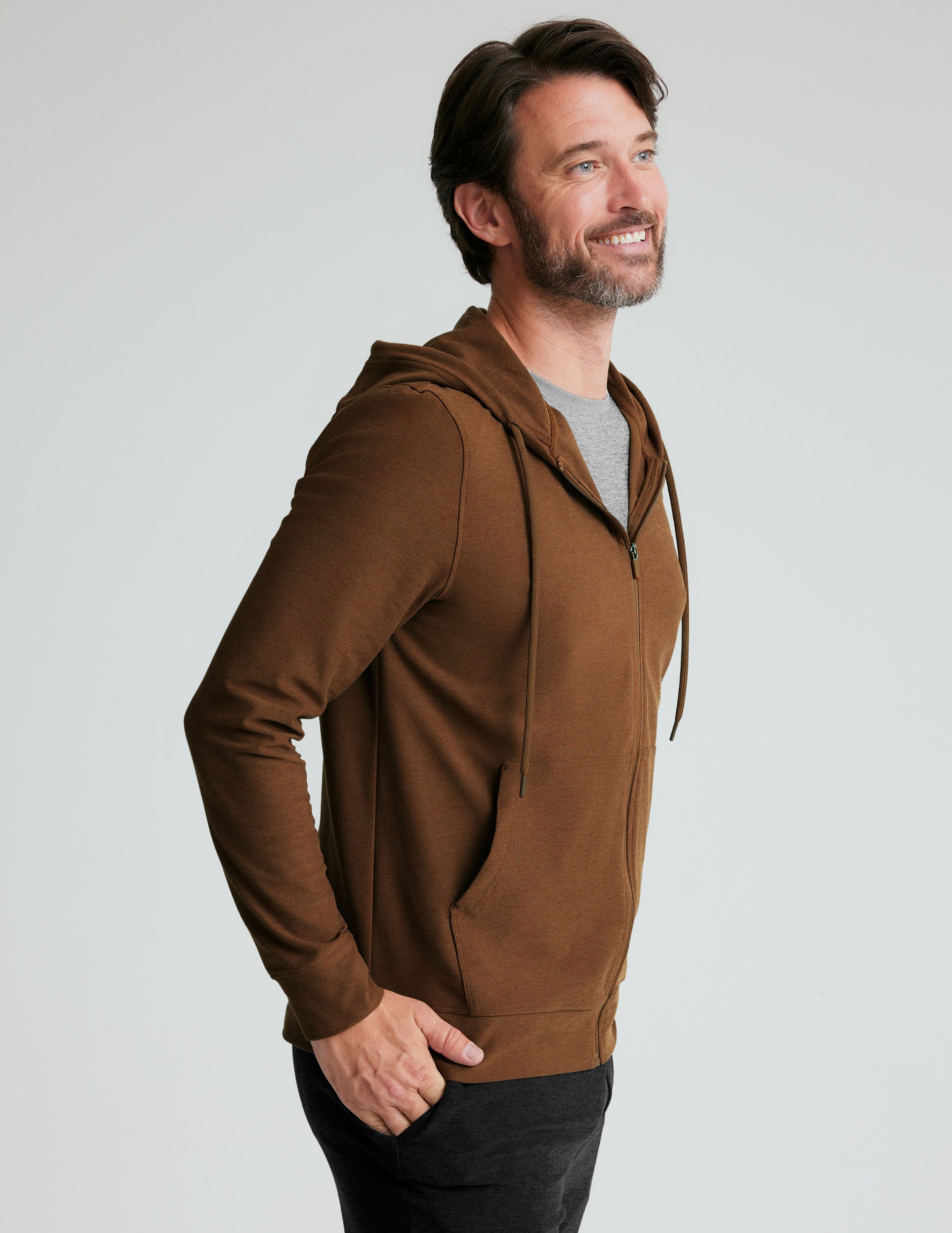 brown men's zip-up jacket with a hood and pockets. 