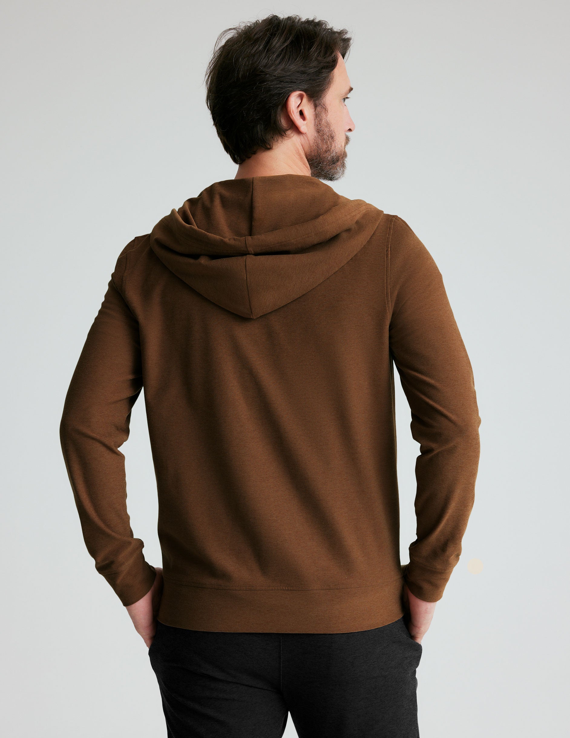 brown men's zip-up jacket with a hood and pockets. 