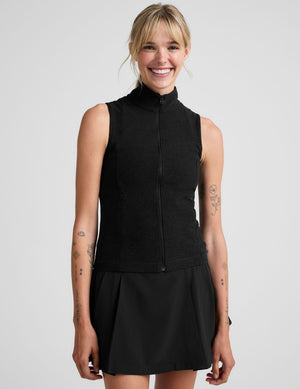 black zip-up vest with a mesh upper back detail. 
