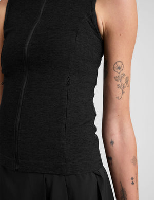 black zip-up vest with a mesh upper back detail. 