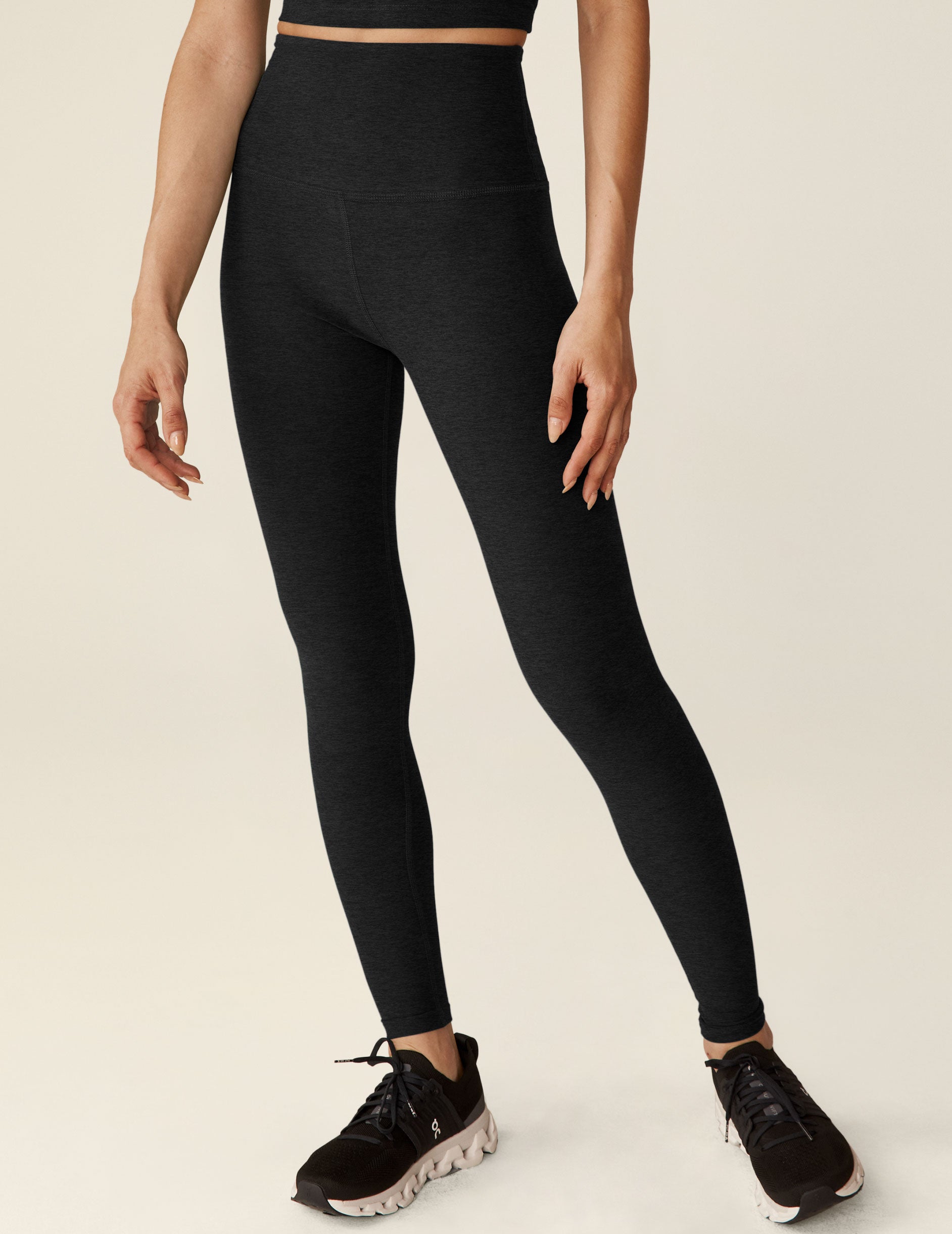 black long high-waisted leggings.