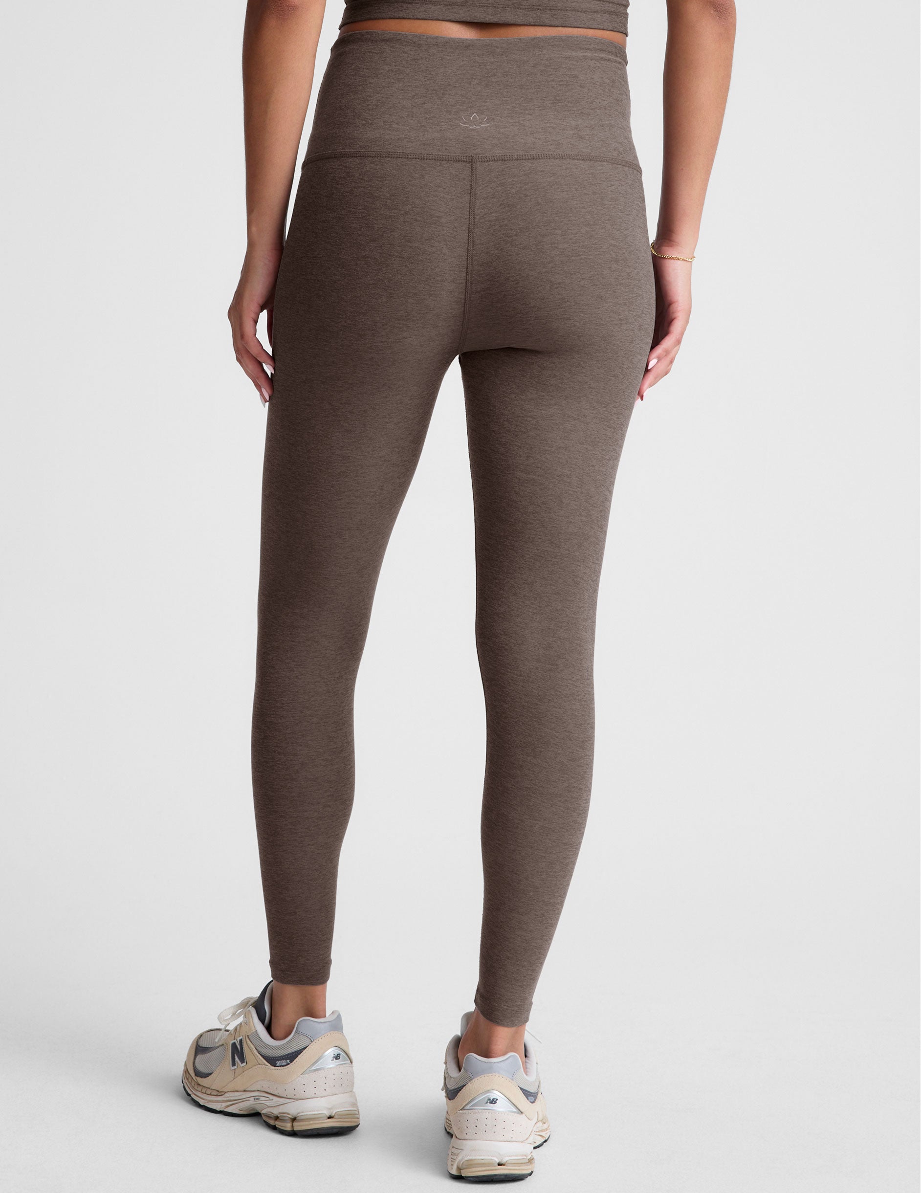 brown high-waisted midi leggings. 