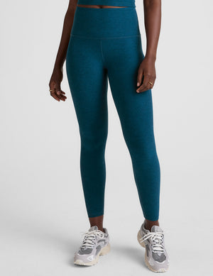 blue high-waisted midi length leggings. 
