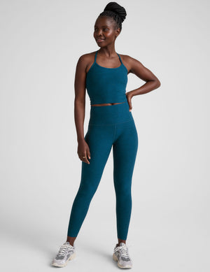 blue high-waisted midi length leggings. 