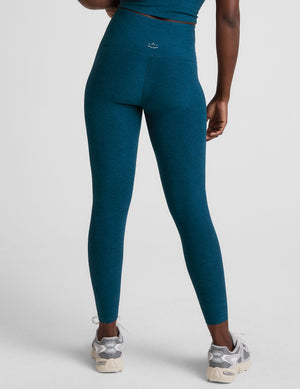 blue high-waisted midi length leggings. 