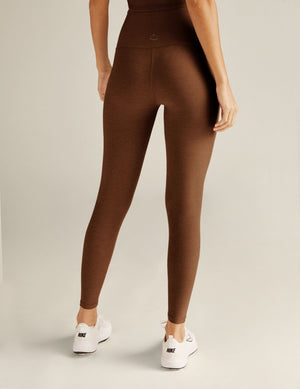 brown high-waisted midi length leggings. 