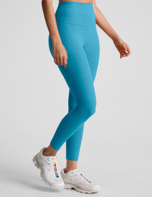 blue high-waisted midi length leggings. 
