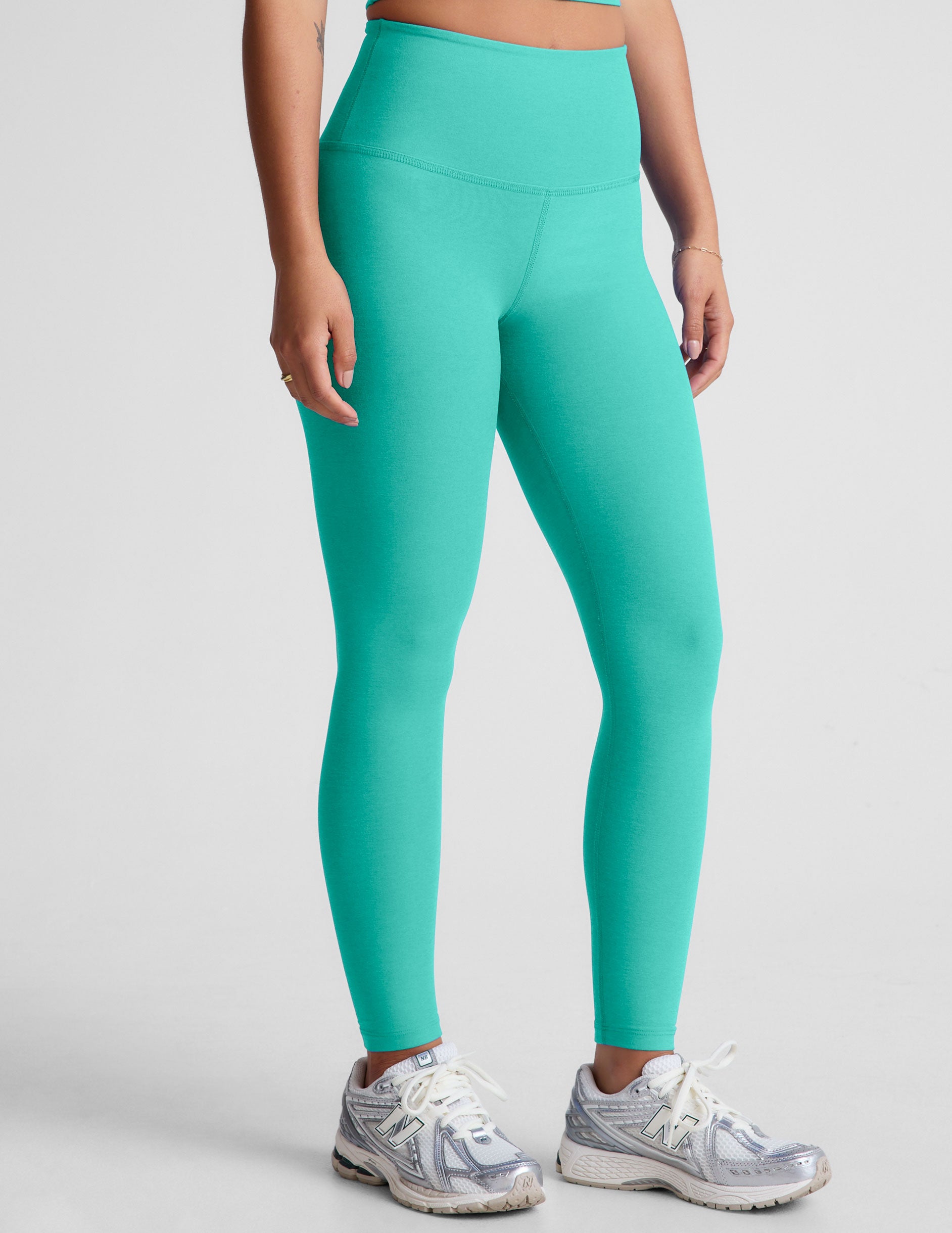 blue high-waisted midi length leggings. 