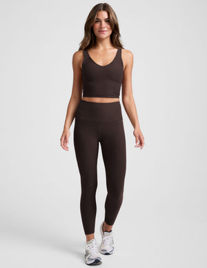 brown high-waisted midi length leggings. 