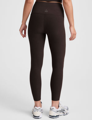 brown high-waisted midi length leggings. 