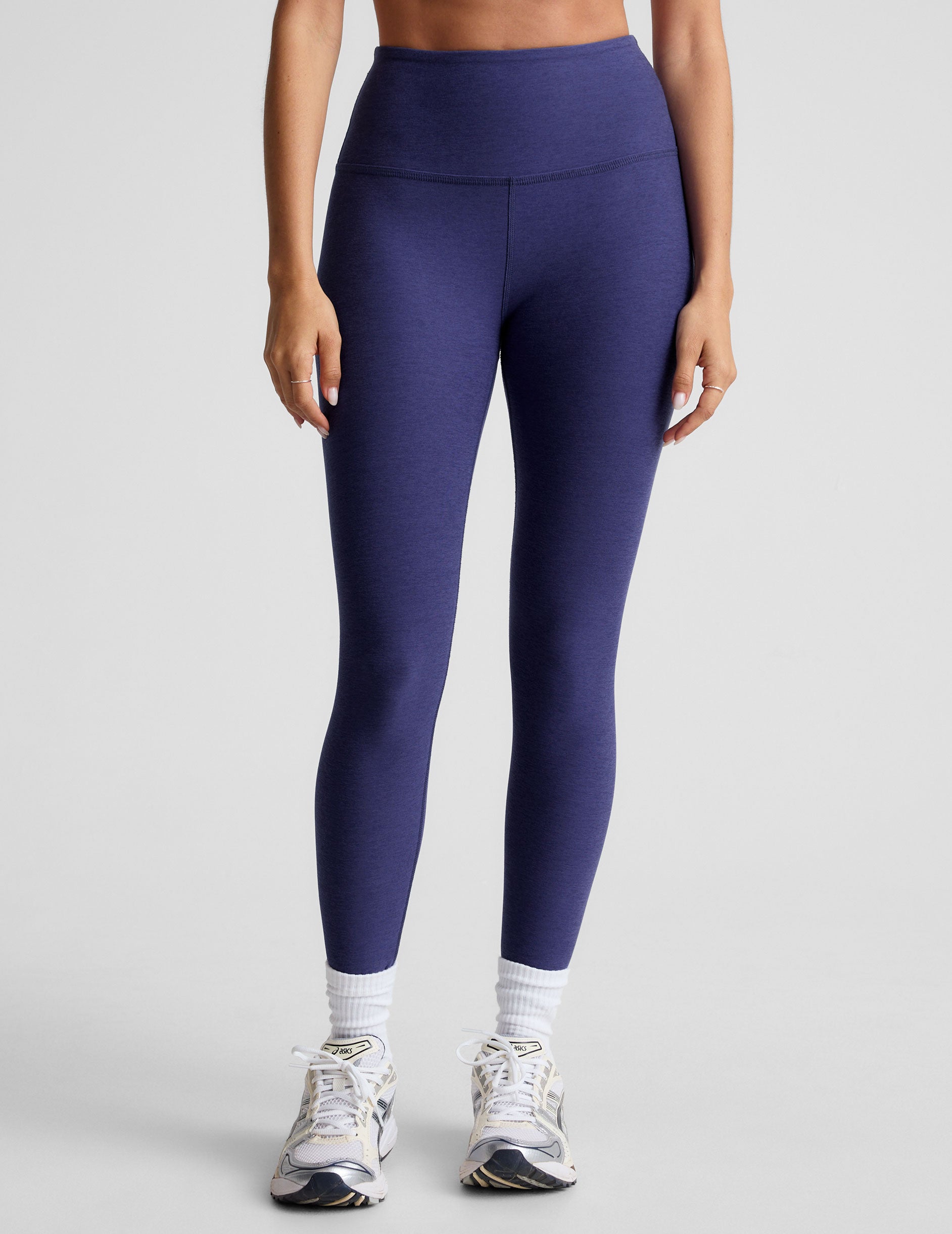 blue high-waisted midi length leggings. 