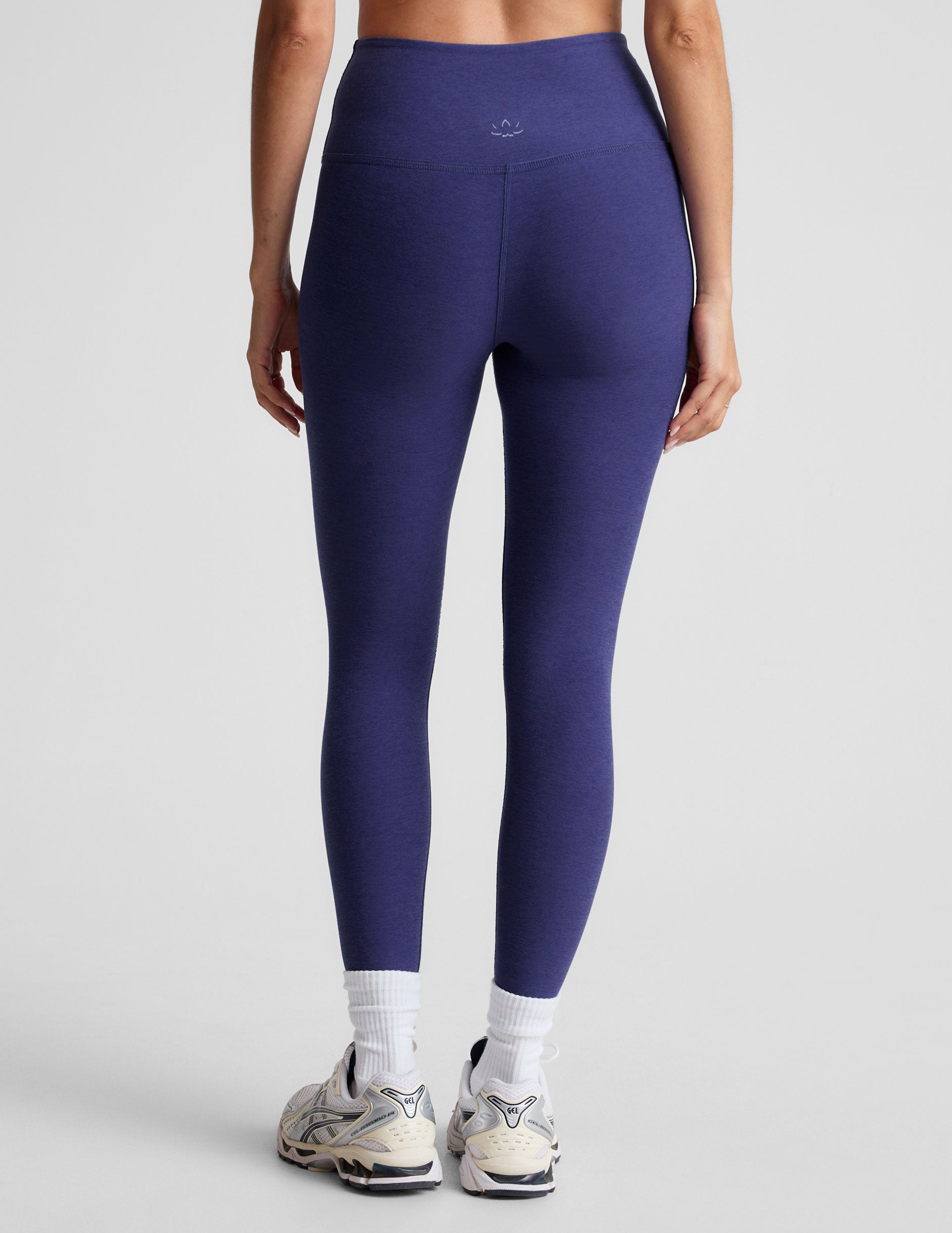 blue high-waisted midi length leggings. 