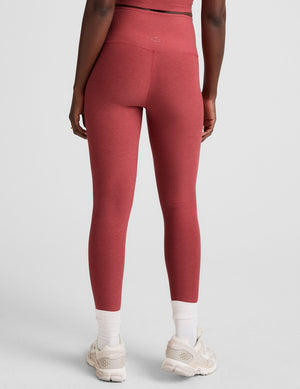 red high-waisted midi length leggings. 