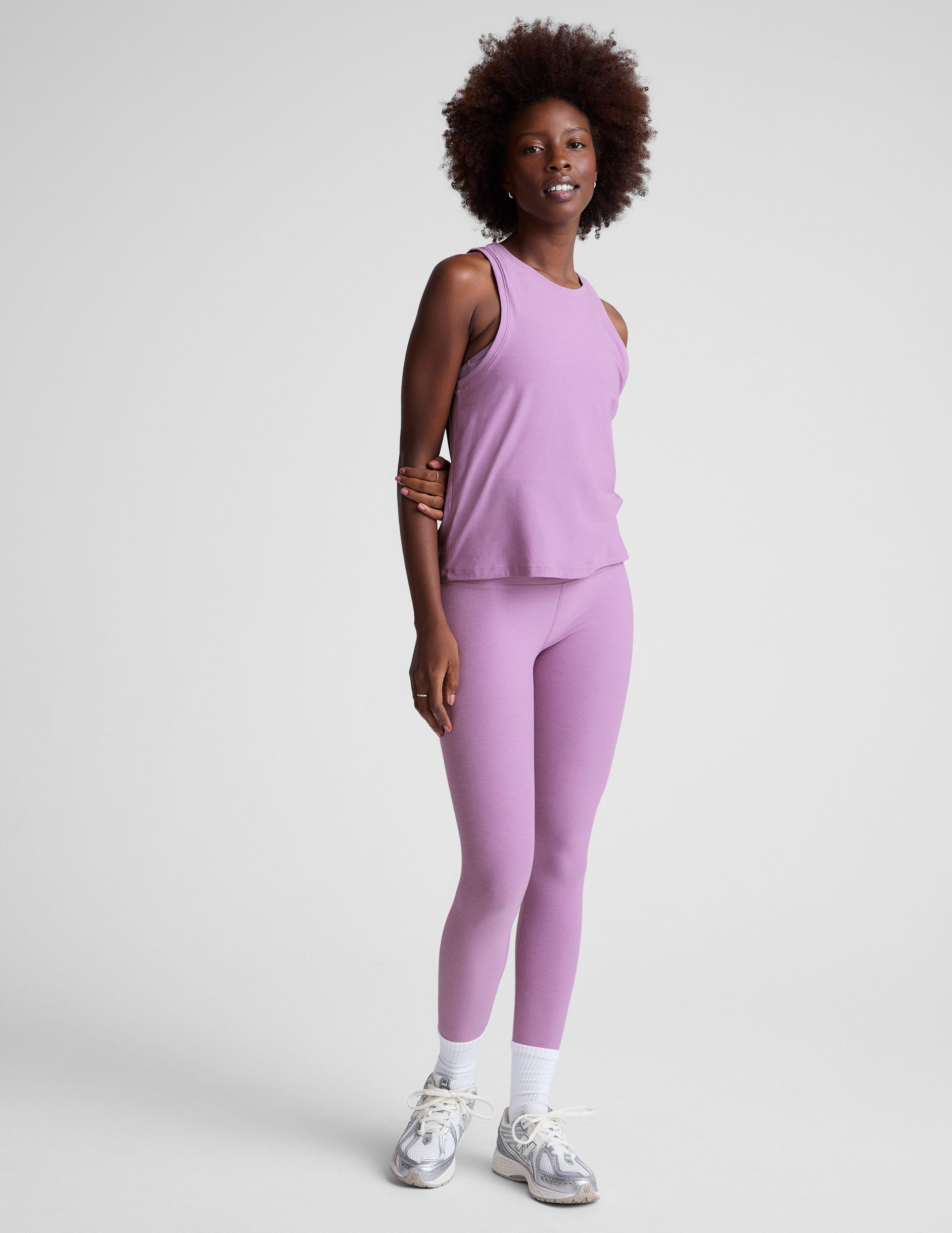 purple high-waisted midi length legging. 