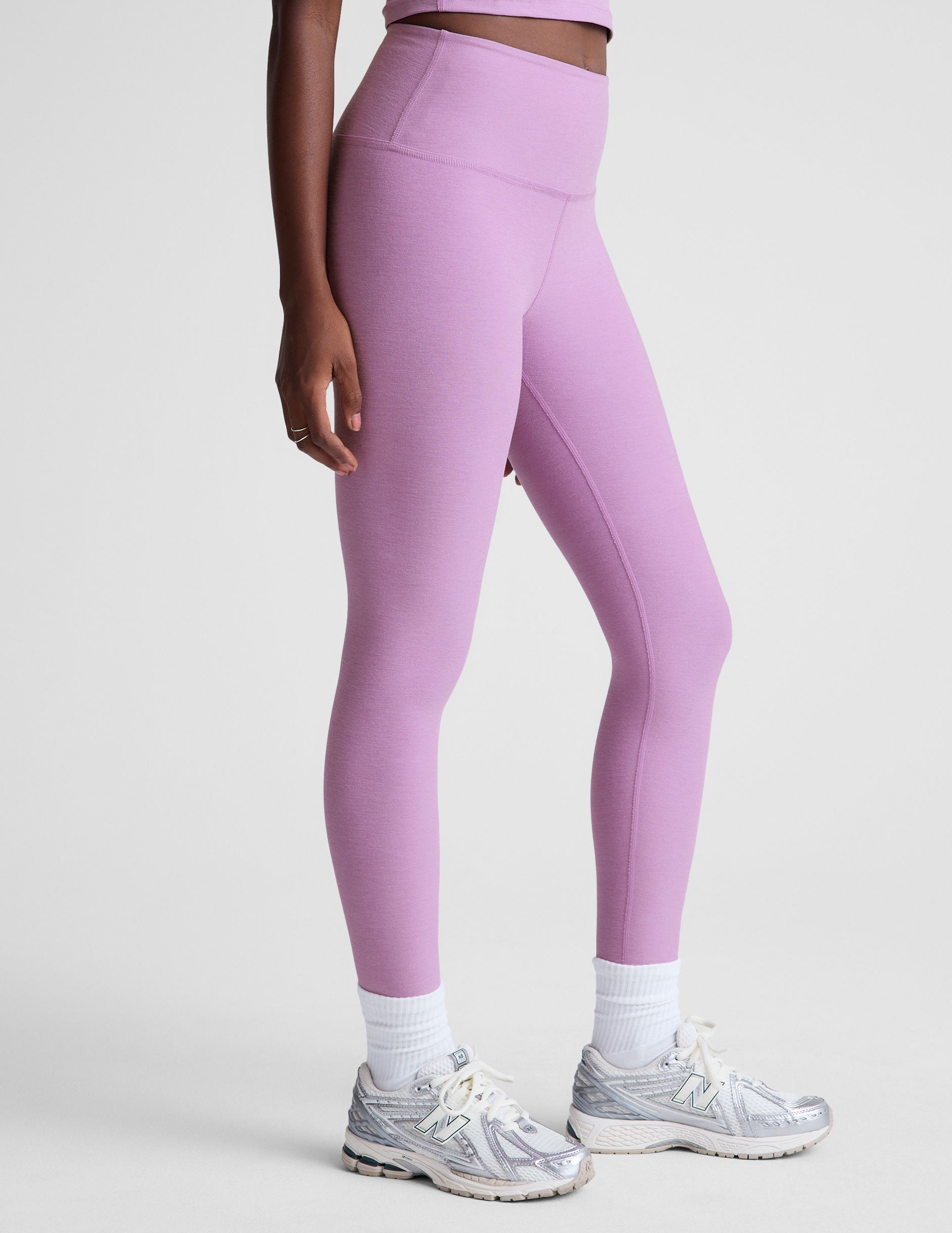 purple high-waisted midi length legging. 