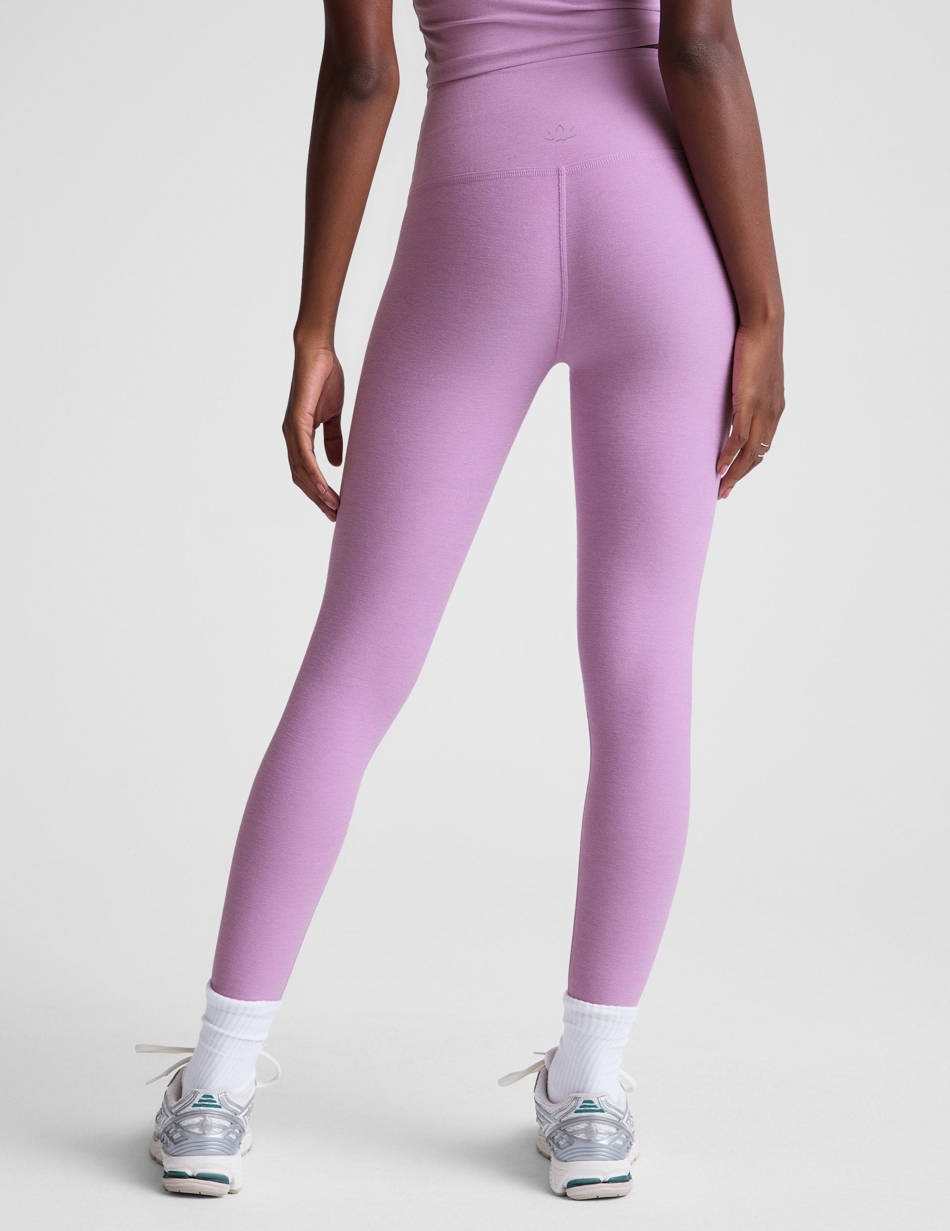 purple high-waisted midi length legging. 