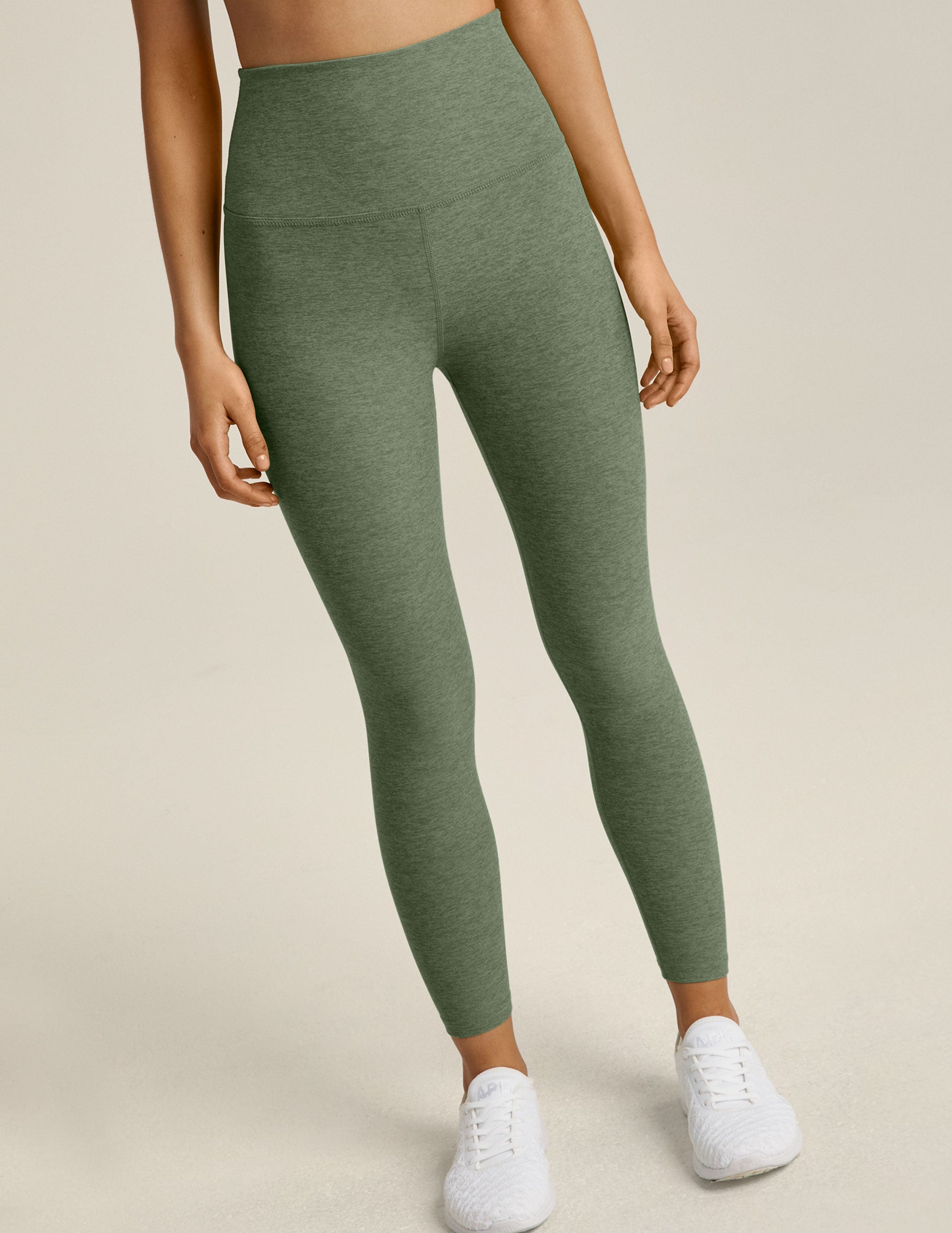green high-waisted midi leggings. 