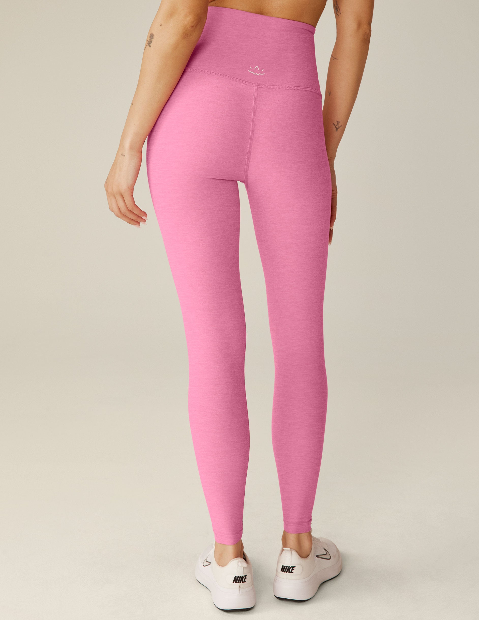 pink high-waisted midi leggings. 