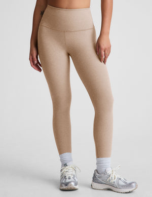 brown high-waisted midi length leggings. 