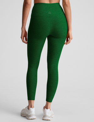 green high-waisted midi length leggings with a 24