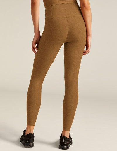 brown high-waisted midi leggings. 