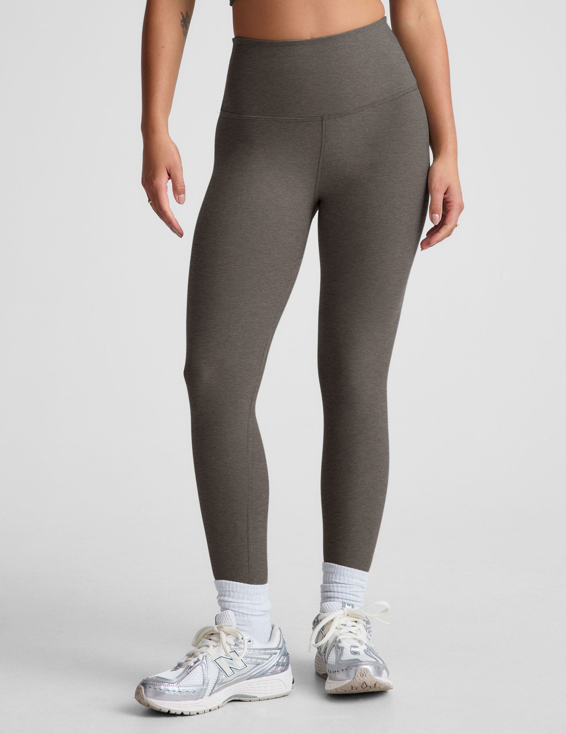 gray high-waisted midi length leggings. 