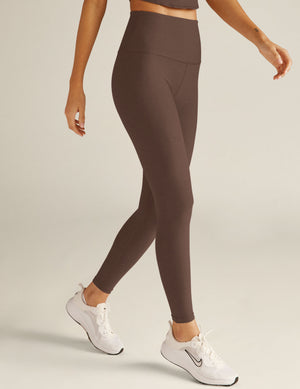 brown high-waisted midi leggings. 