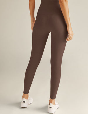 brown high-waisted midi leggings. 