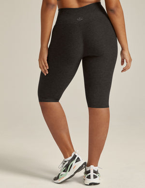 Rear view of Spacedye Pedal Pusher High Waisted Leggings in dark gray marled fabric, ending just below the knee.