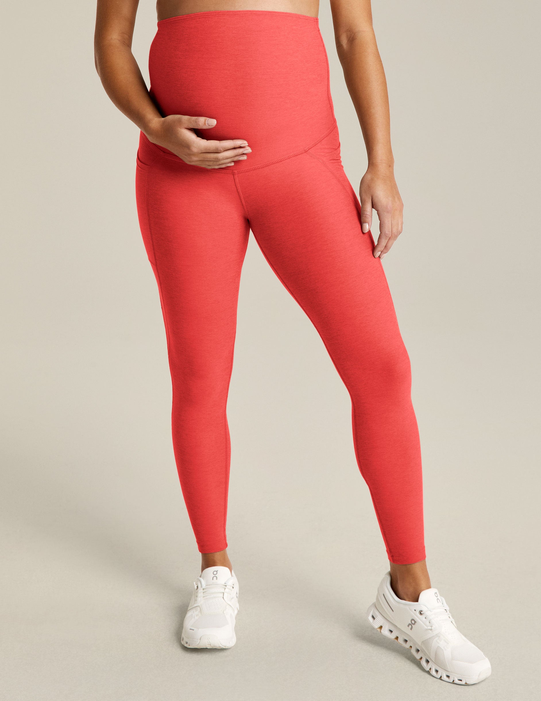 pink maternity midi leggings with pockets at sides