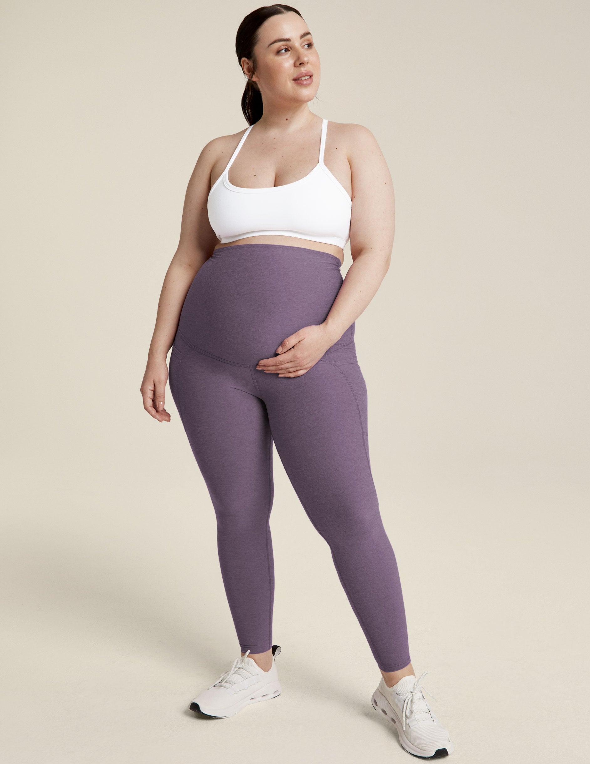 purple maternity midi leggings with side pockets.