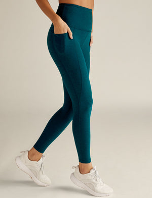 blue high-waisted midi spacedye leggings with side pockets. 