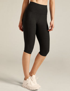 Spacedye High Waisted Pocket Pedal Pusher Legging in marled black, showing the high waistband, side pocket, and knee length.