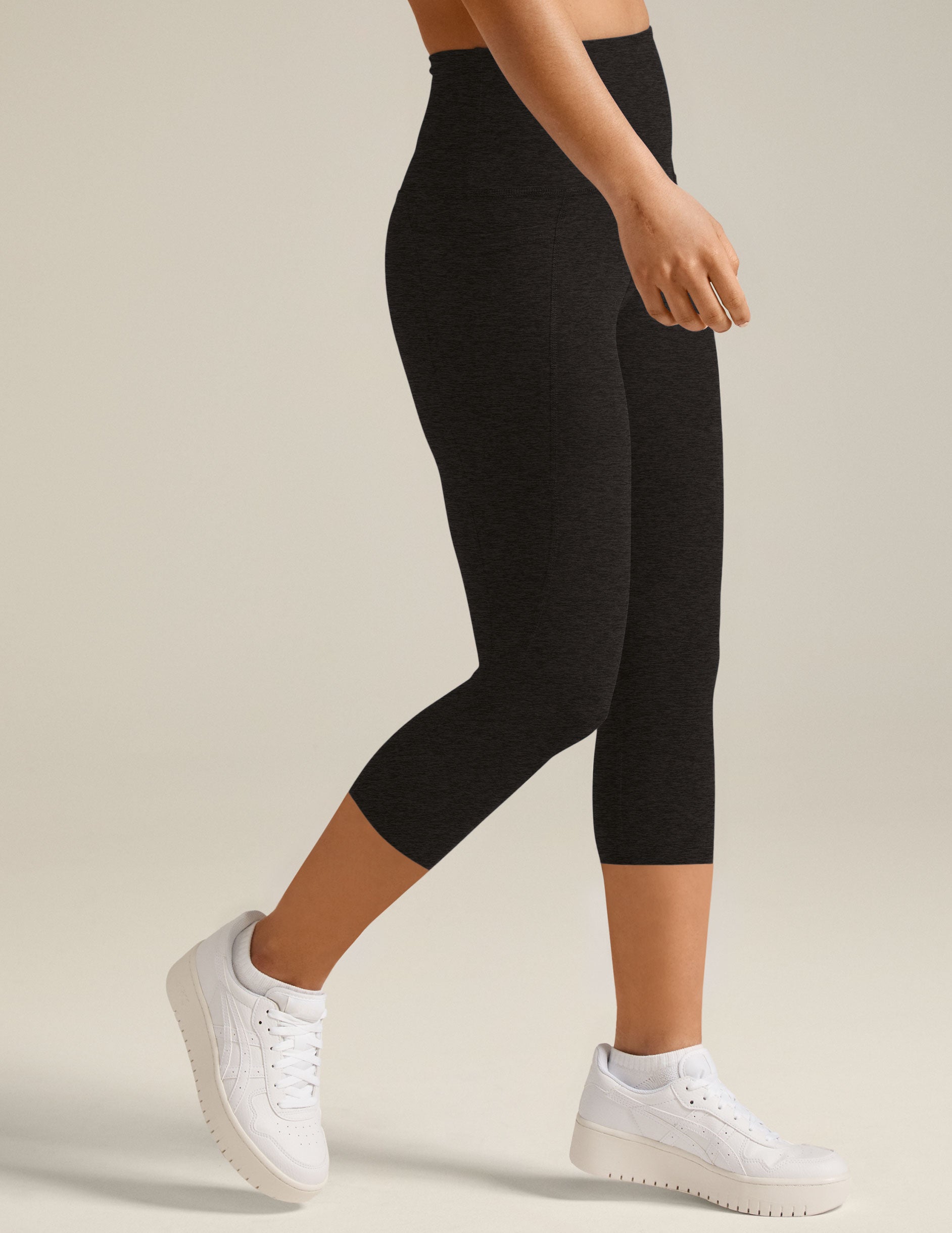 black capri midi legging with pockets at sides.