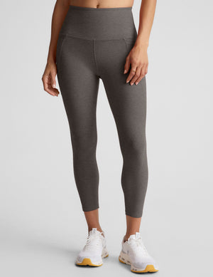 Spacedye Out Of Pocket High Waisted Capri Legging in dark gray marled fabric, featuring side pockets and a wide waistband.