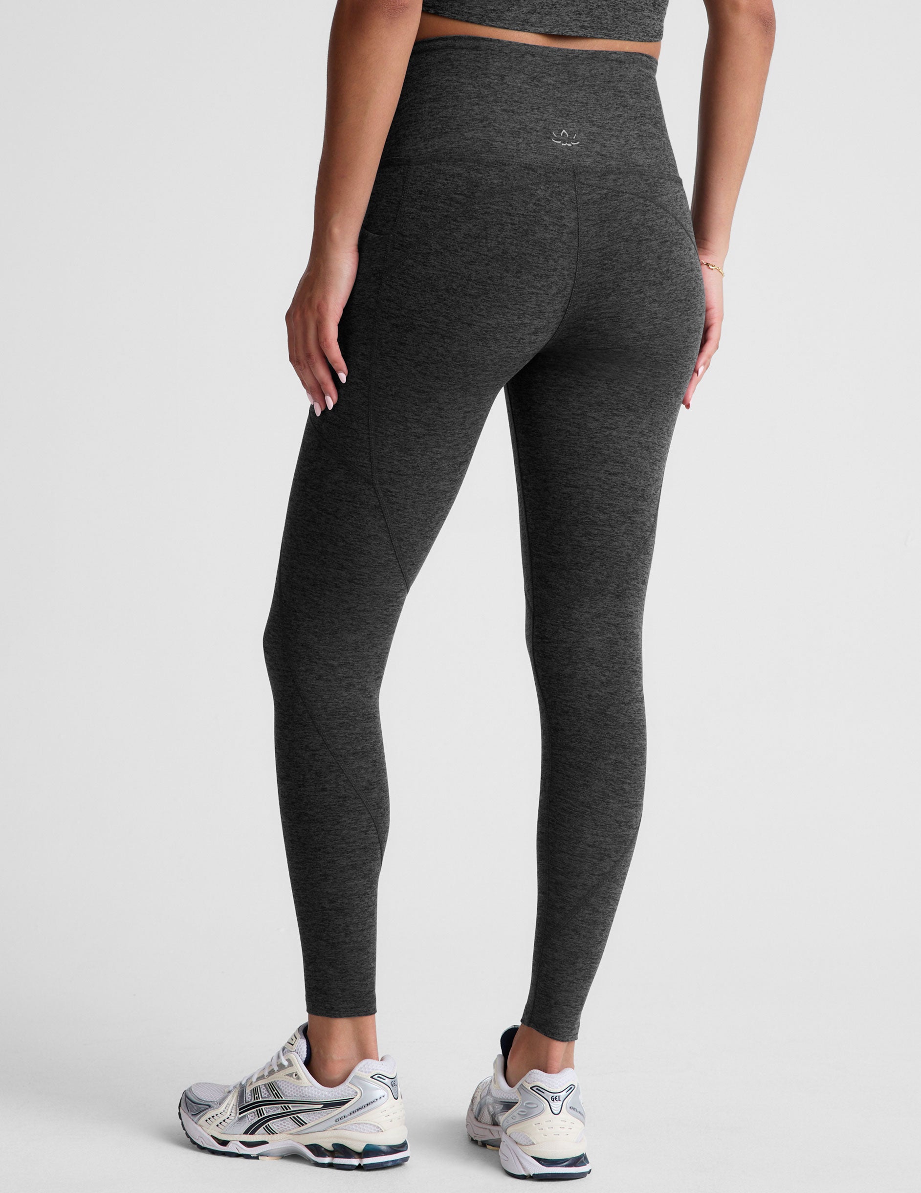 black-charcoal high-waisted midi leggings with side pockets. 